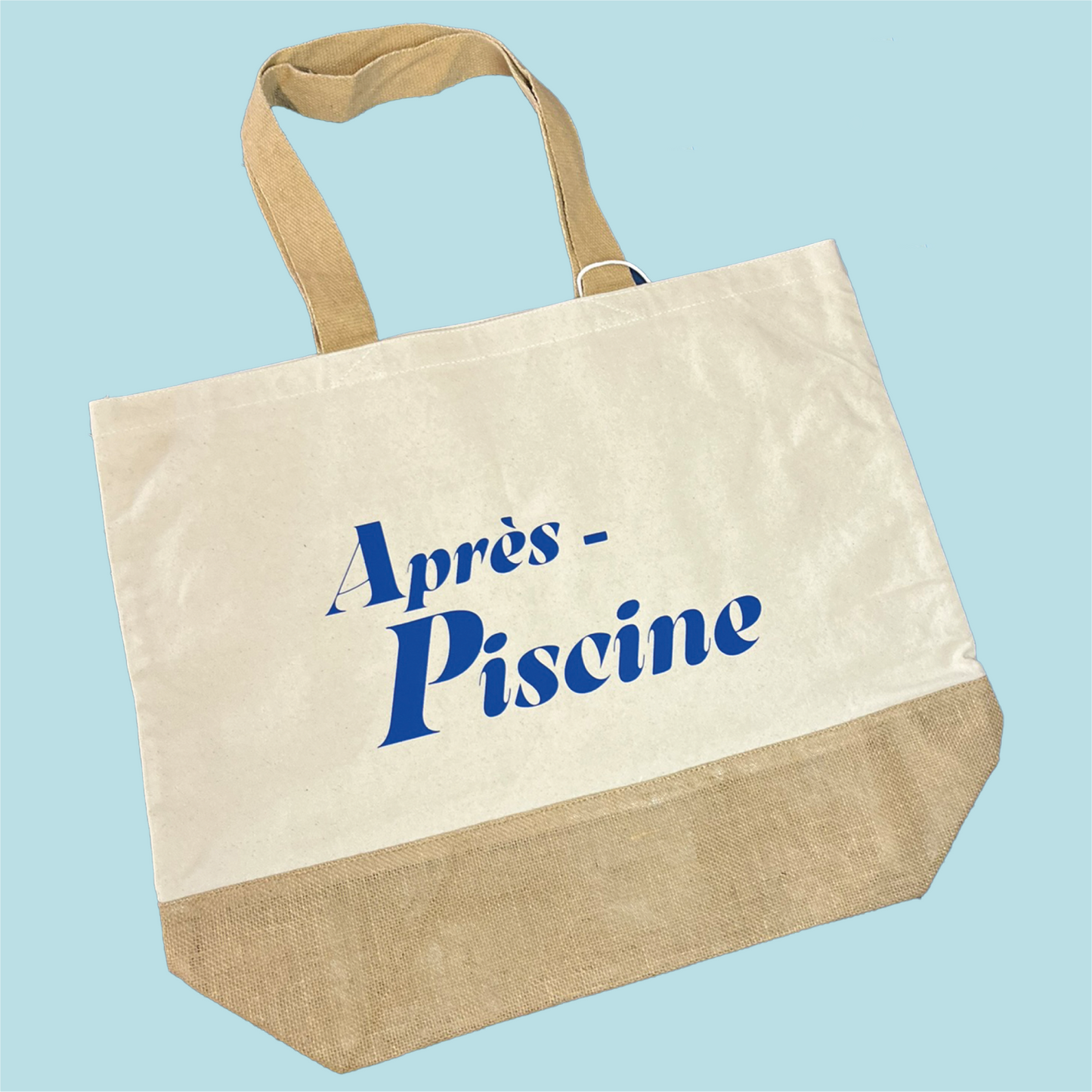 Bolsa de algodón y yute con mensaje Après piscine en azul Studio Hilma