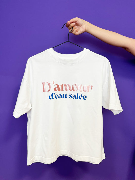 Camiseta unisex de algodón corte boxy color blanca con mensaje positivo – Hilma studio