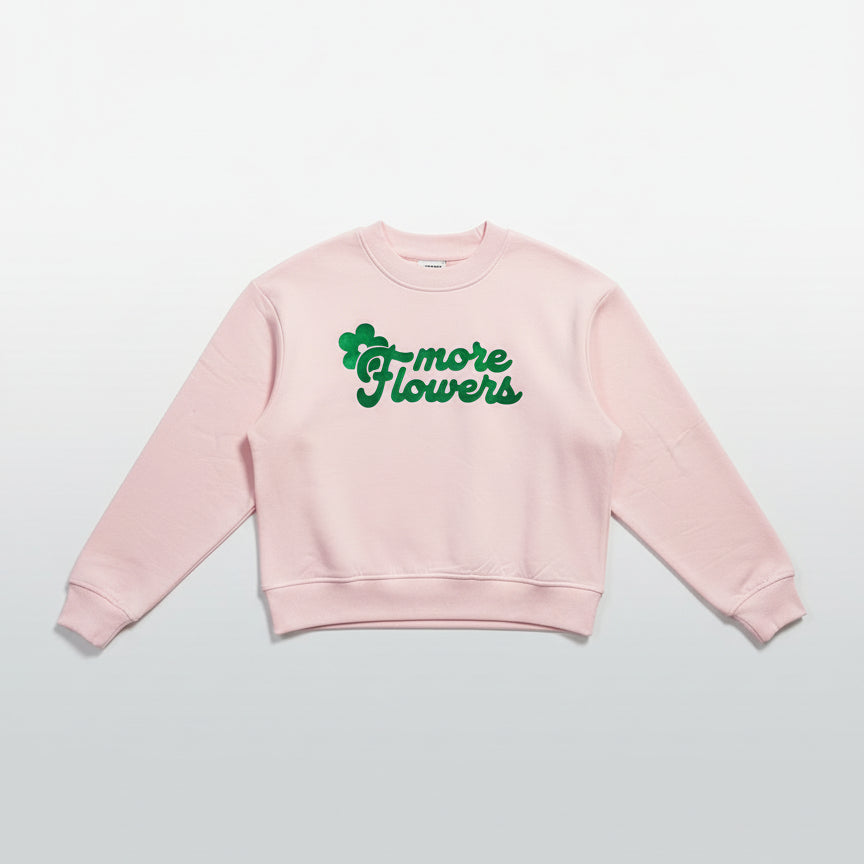 Sudadera rosa corta boxy de algodón orgánico con mensaje More Flowers –Hilma Studio