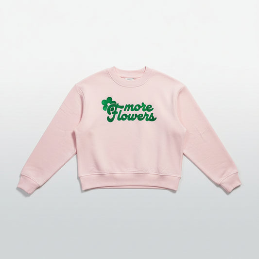 Sudadera rosa corta boxy de algodón orgánico con mensaje More Flowers –Hilma Studio